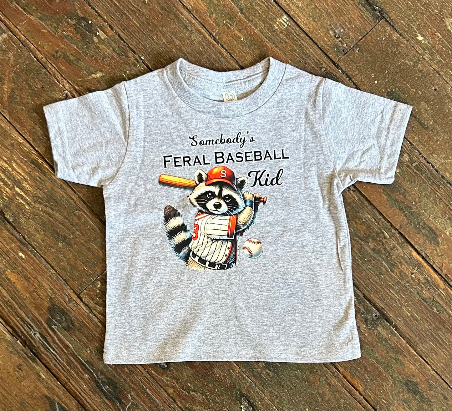 Somebody’s Feral Baseball Kid Raccoon Tee