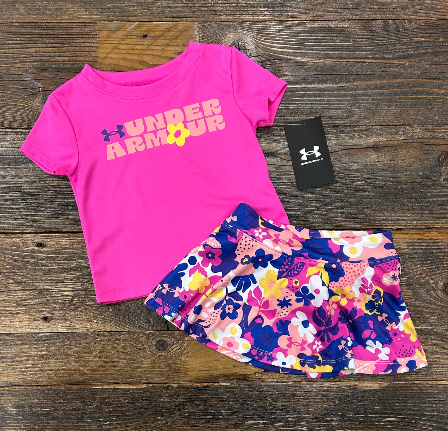 Under Armour Rebel Pink Shirt & Floral Skort Set